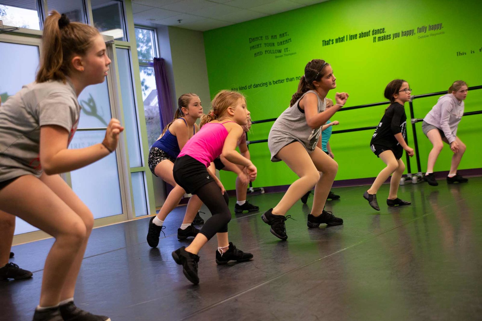 Group of girls learning a dance routine